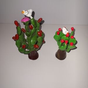 Charming Green Cactus Figurines with Red and Pink Details